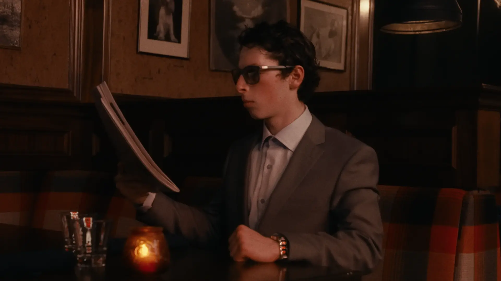 Afternoons at Otto's — the courier waits at the bar